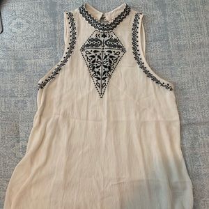 Sleeveless embroidered high neck top